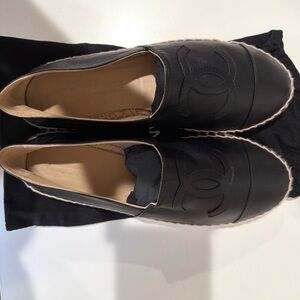 CHANEL Black Leather Espadrille Slip-Ons with Logo Stitching